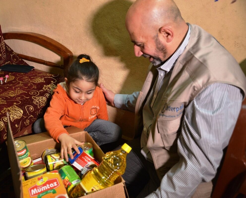 Delivering winter food parcels to Palestinian refugees in Lebanon, December 2014