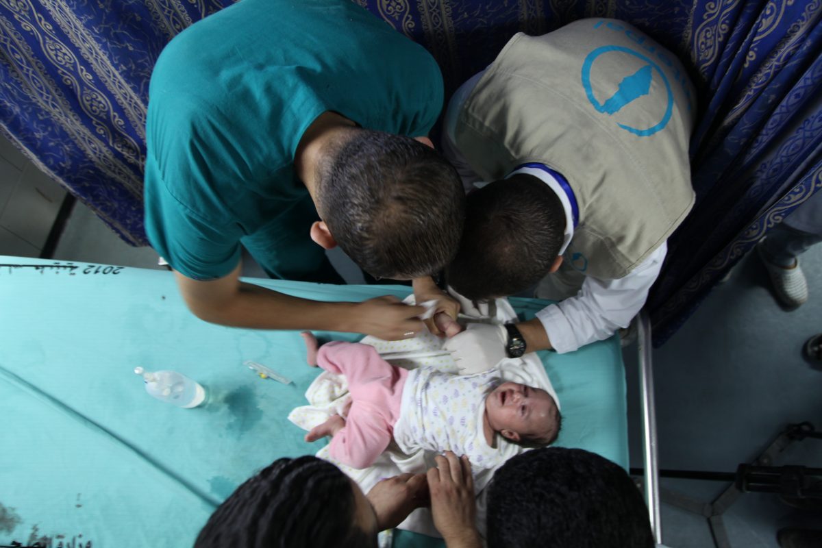 Interpal sponsored doctors take care of a Palestinian infant