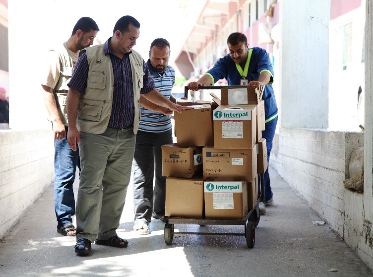 Interpal staff deliver vital medical aid to a Palestinian clinic