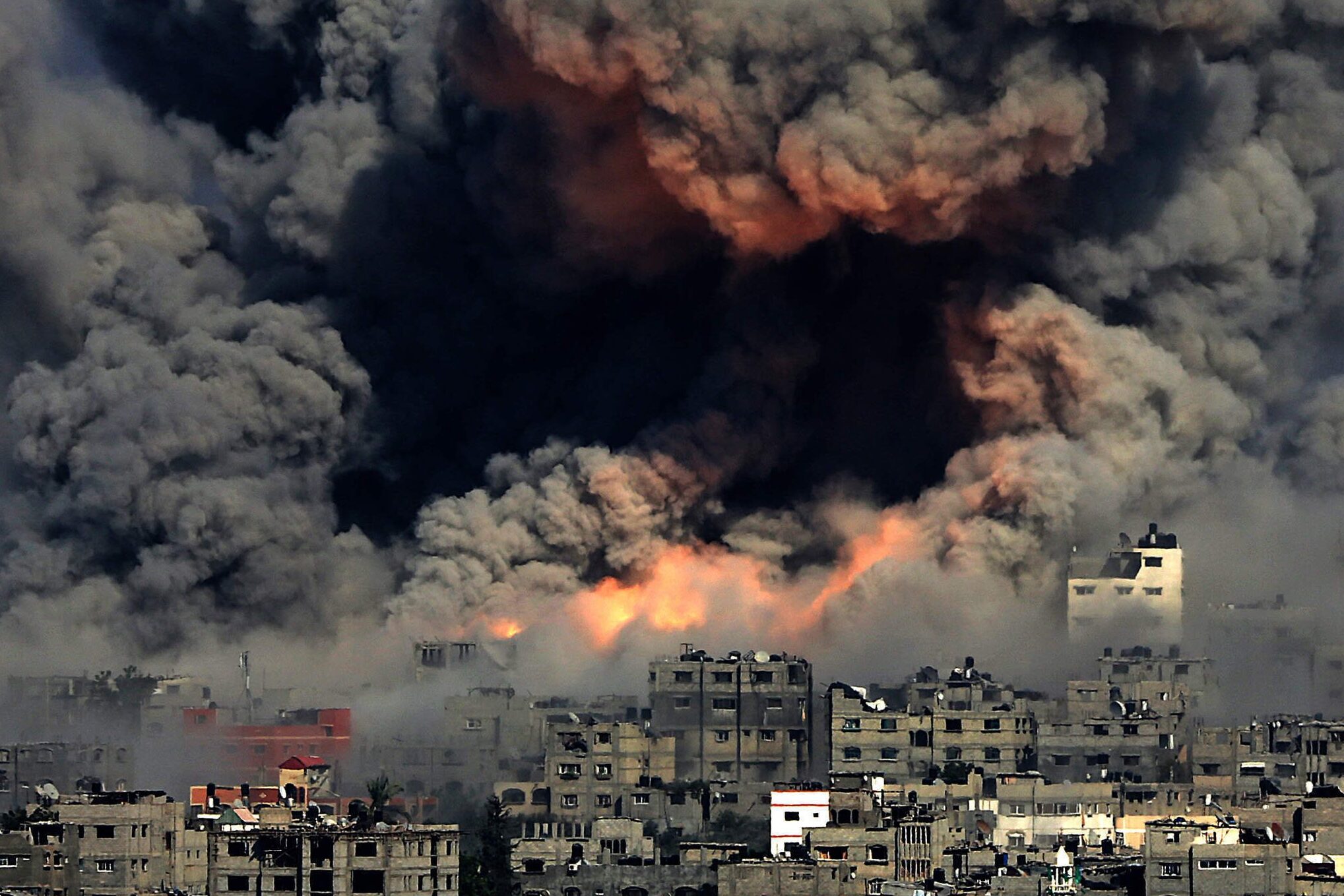 Israeli bomb explodes in Gaza, with smoke engulfing everything