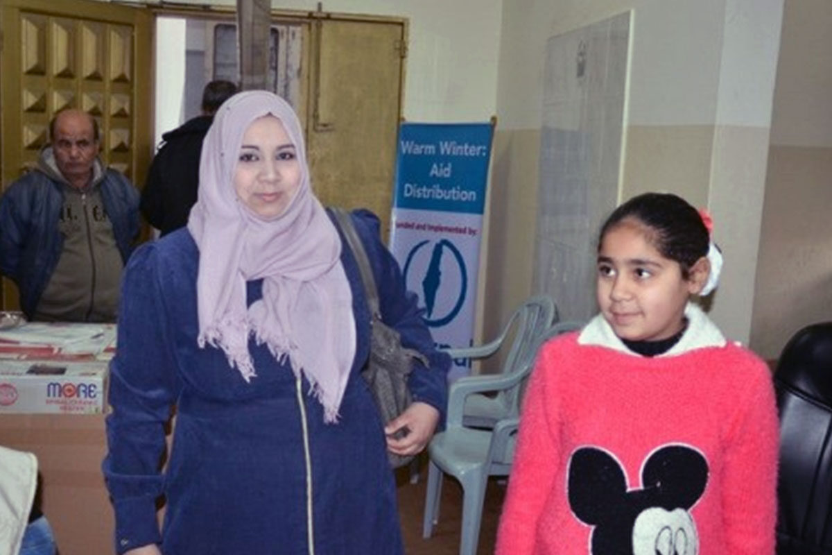 Saeda Shaladan; a 40-year-old mother of five from Gaza, pictured in 2017 during our Winter Humanitarian Aid campaign