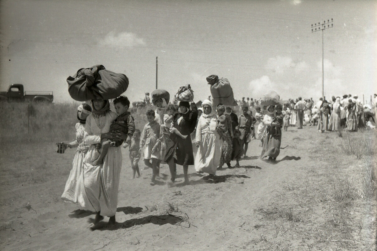 Palestinian women and children flee the village of Tantura, after the Israeli paramilitary group Haganah massacred over 200 people after they surrendered, on 22-23 May 1948 [Meitar Collection / National Library of Israel / Wikimedia]