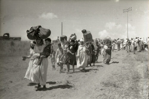 Palestinian women and children flee the village of Tantura, after the Israeli paramilitary group Haganah massacred over 200 people after they surrendered, on 22-23 May 1948 [Meitar Collection / National Library of Israel / Wikimedia]